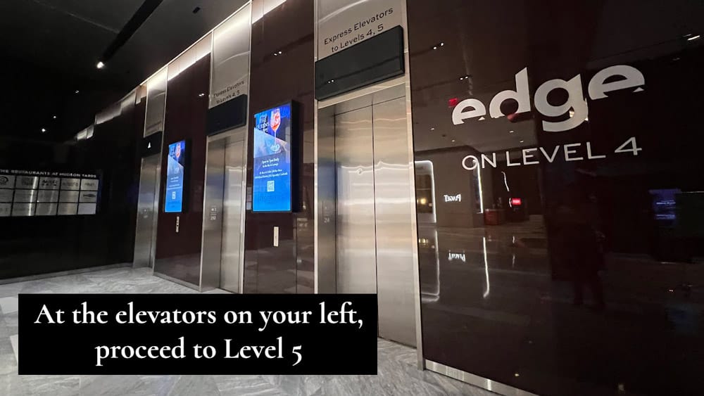 At the elevators on your left, proceed to Peak at Level 5.