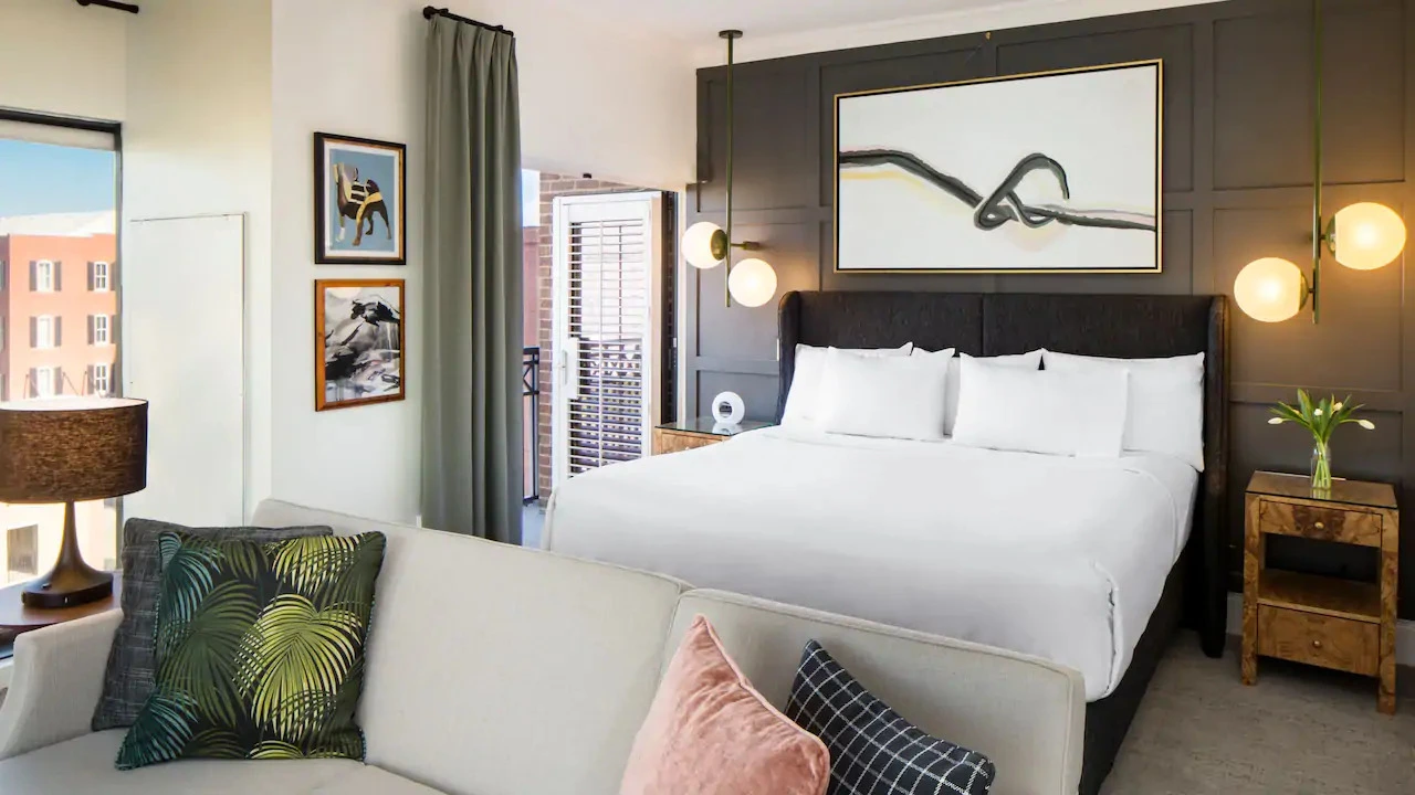 hospitality guestroom at Hyatt Andaz Savannah showing integrated artwork, coordinated finishes, and design elements supporting guest experience and hospitality storytelling