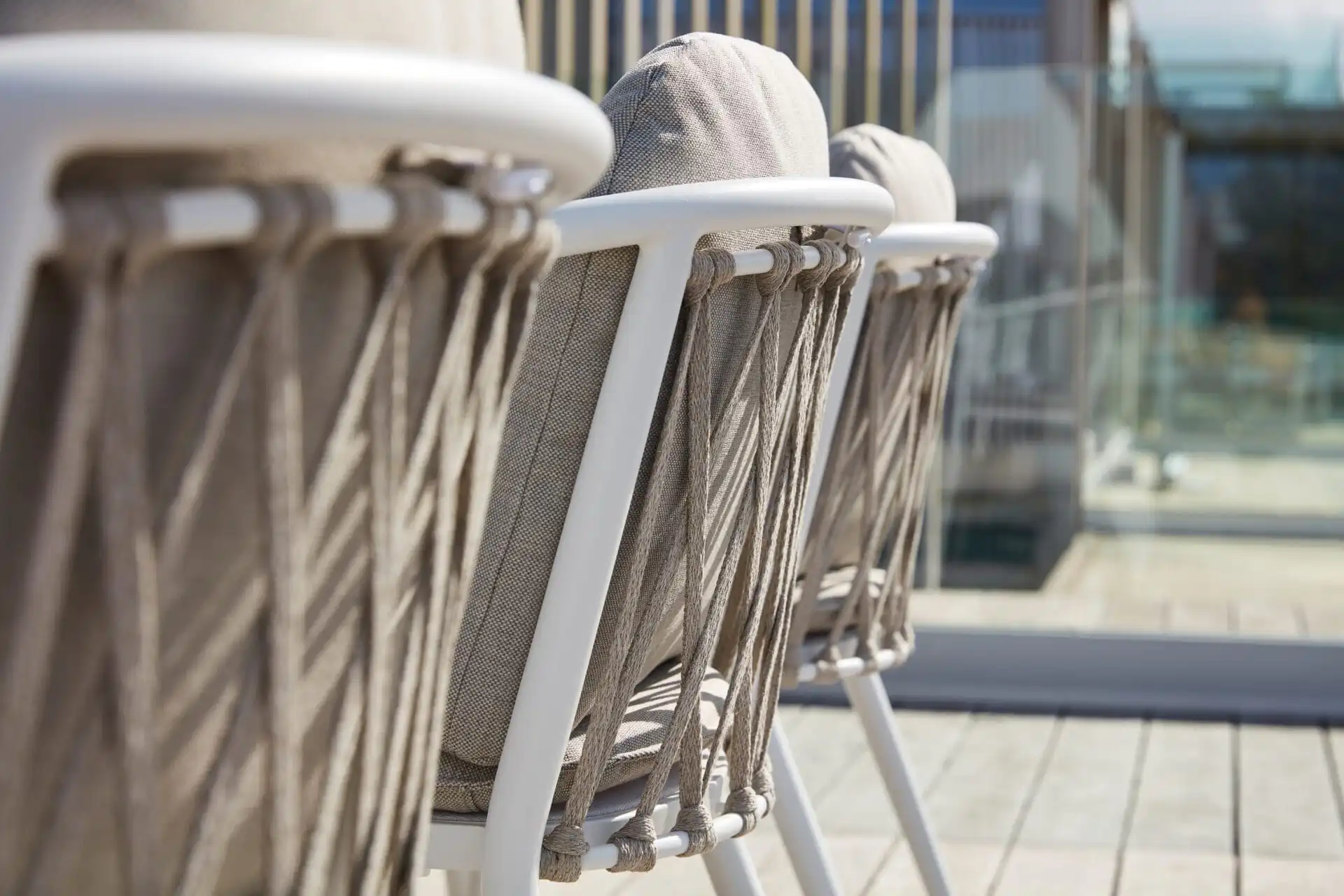 Marine-grade outdoor hospitality furniture by Akula Living showcasing durable rope detailing and weather-resistant materials designed for luxury hospitality environments.