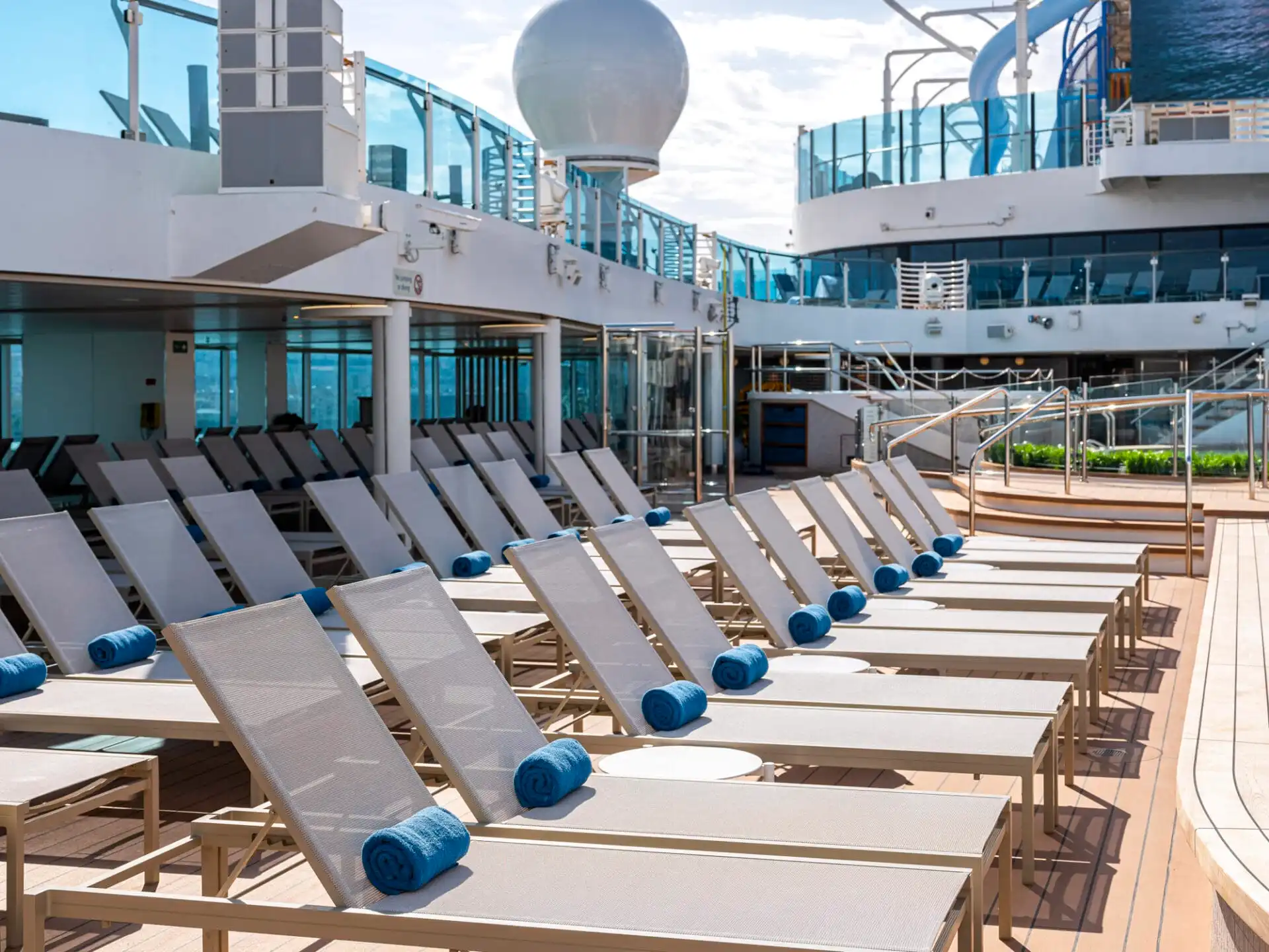 Marine-grade outdoor hospitality furniture by Akula Living installed aboard Princess Cruises, demonstrating durable outdoor design for hospitality environments.