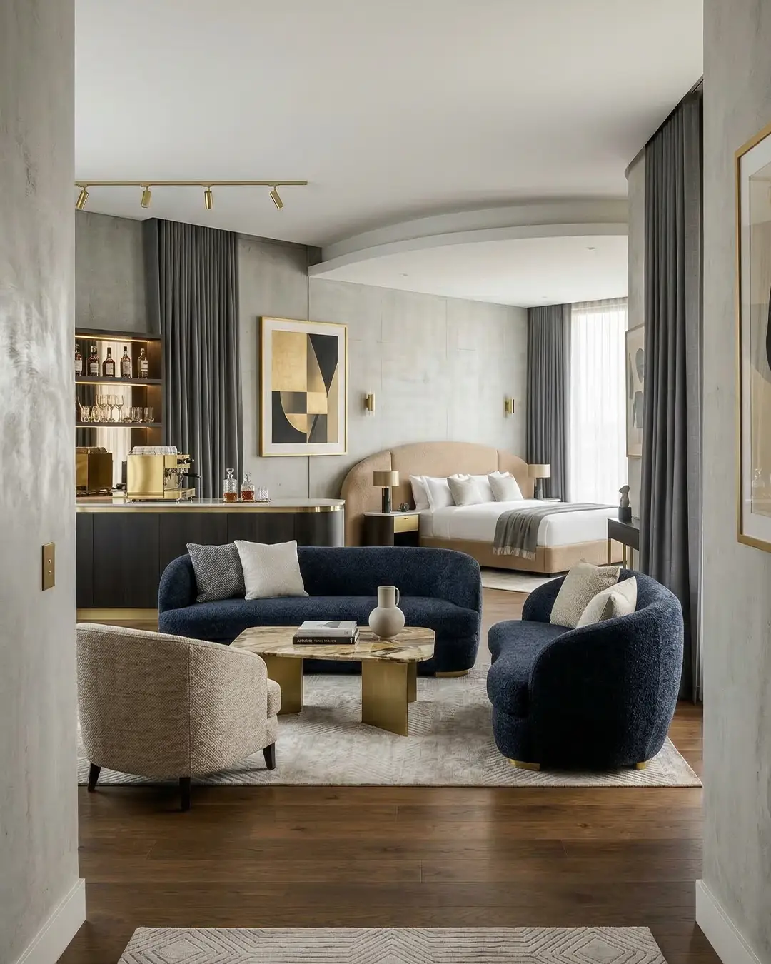 Luxury hotel suite featuring Valley Forge Fabrics hospitality performance textiles across upholstered seating, decorative fabrics, and soft finishes that create a refined guest experience.