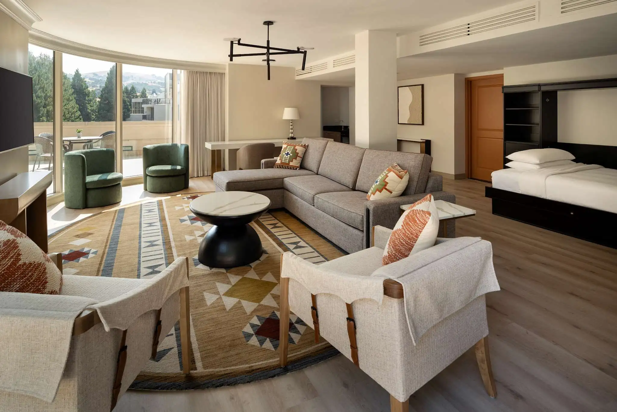 Completed Hotel Contessa guest suite showcasing the result of disciplined hospitality preliminary budgeting and coordinated FF&E procurement by Beyer Brown